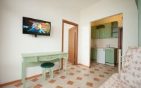 Номер Апартаменты 2-местный 2-комнатный (вид на сад) — фото «Эко Вилладж» / «Eco-Village» курортный комплекс