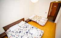 Номер Апартаменты 4-местный (с лоджией и общей кухней) — фото «Фаворит» апартаменты