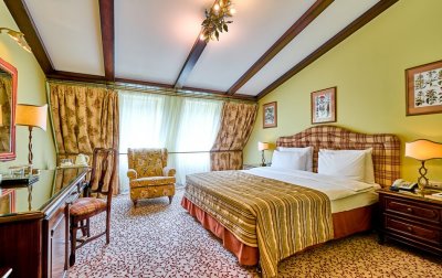 Номер Делюкс Кинг 2-местный (мансарда) — отель «Grand Hotel Polyana» / «Гранд Отель Поляна» гостиница