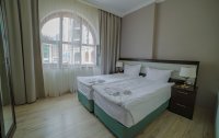 Номер Апартаменты Cтандартный 10-местный (Поляна 540, 5 спален) — фото «Красная поляна» комплекс апартаментов (бывш. «Горки Город»)