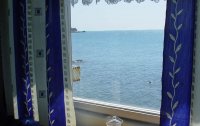 Номер Эконом 2-местный 1-комнатный (климатопавильон, вид на море, частичные удобства) — фото «Лиго Морская» курортный комплекс