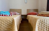 Номер Номер 4-местный 2-комнатный — фото «Никос» гостиница