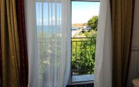 Номер Люкс 2-местный 2-комнатный (корпус Посейдон) — фото «Песочная Бухта» парк-отель